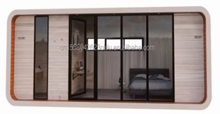 Container Gebäude – Wohn-Container · Schlafmodul · weiße Kapsel-Fassade · Panorama-Glas